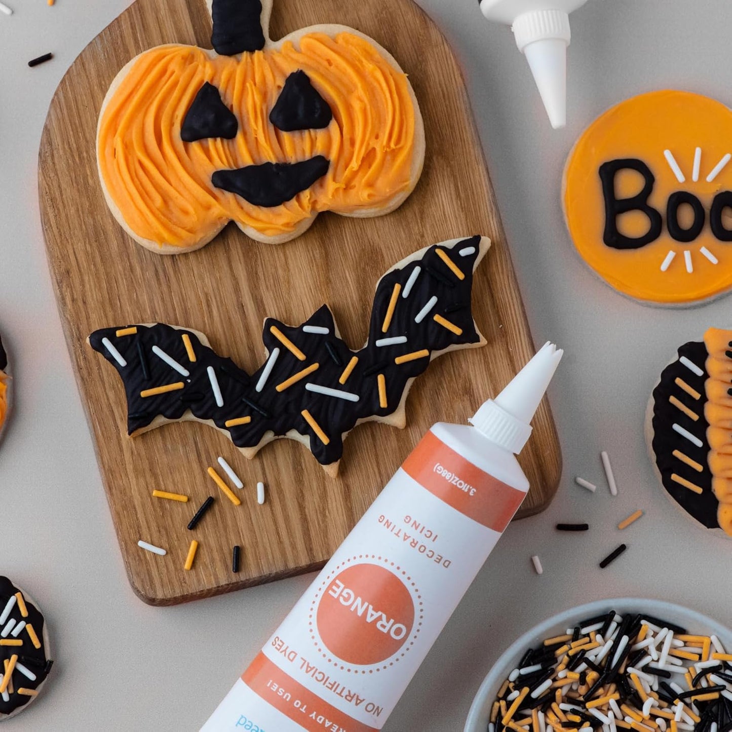 Sweets Indeed Dye-Free Halloween Frosting & Sprinkles Set – 8.22 oz | 2 Frosting Tubes (Orange & Black) + 2 Decorating Tips + 2 oz Sprinkle Mix (Black, Orange & White) | No Artificial Dyes Cupcake & Cookie Decorating Kit