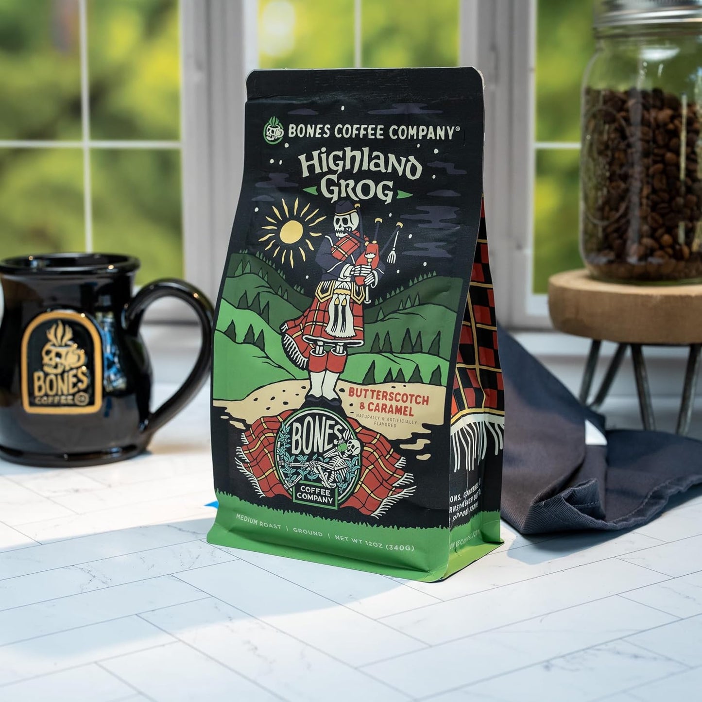 Bones Coffee Company Highland Grog, Butterscotch Caramel Flavored Coffee, Medium Roast Low Acid Arabica Beans Compatible with Auto drip and French Press Coffee Maker, 12 Oz Whole Bean