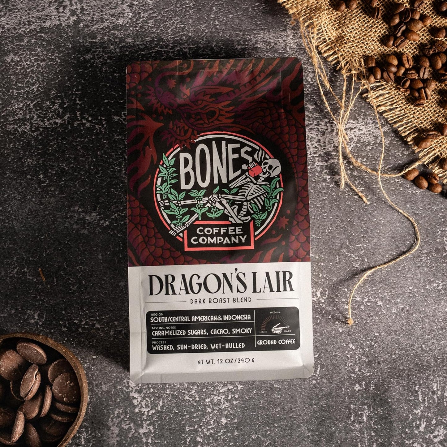 Bones Coffee Company Dragon's Lair, Smokey, Cacao and Caramelized Sugar Notes, Unflavored Coffee, Medium Roast Low Acid Arabica Beans Compatible with Auto drip and French Press Coffee Maker, 12 Oz Ground