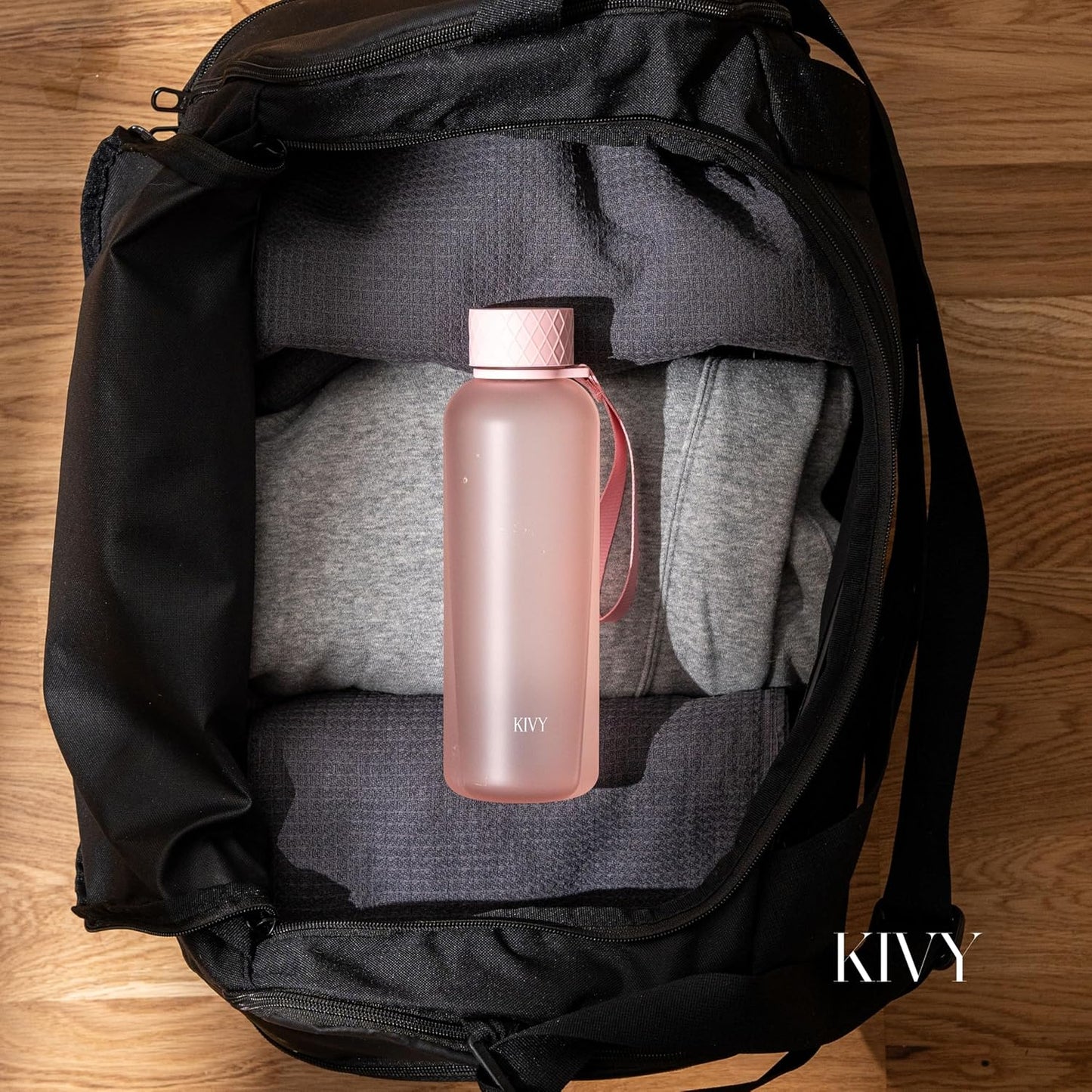 KIVY Slim Water Bottle 22oz [BPA FREE] - Small Drinking Waterbottle - Tritan Bottle Without Straw for School, Sport & Travel - Drinking Bottle Dishwasher Safe